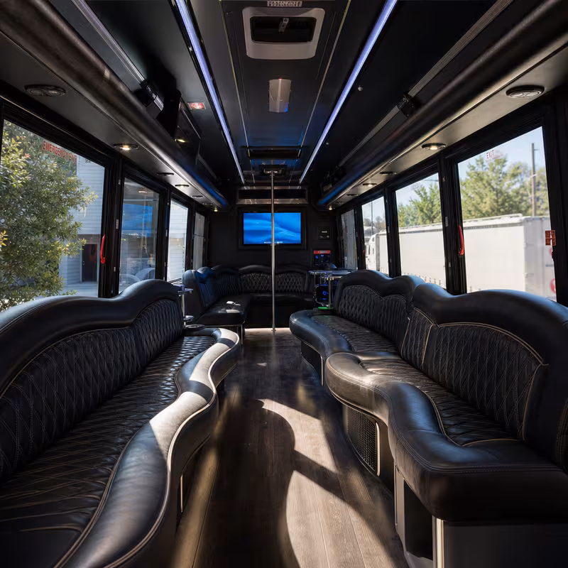 Friends laughing during a Amarillo party bus celebration