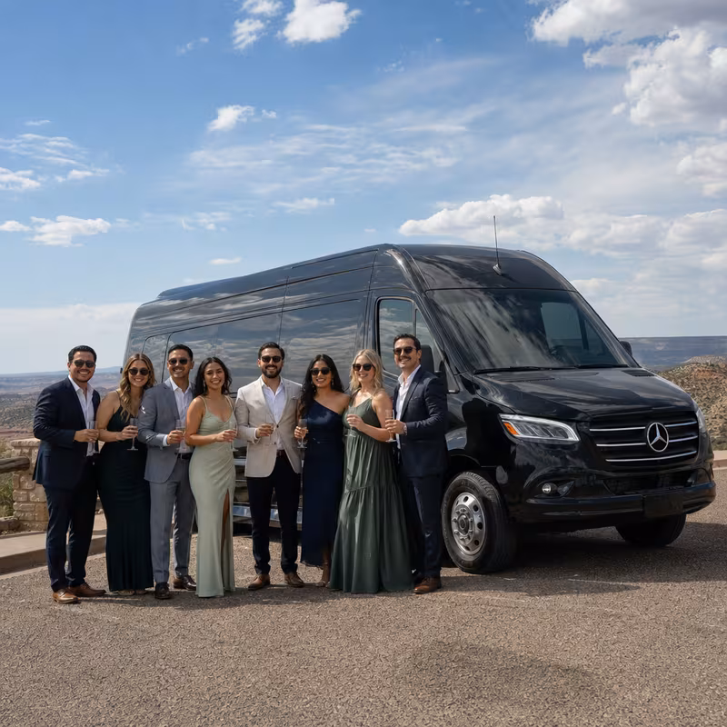 Group beside a Mercedes Sprinter limo from the Amarillo fleet