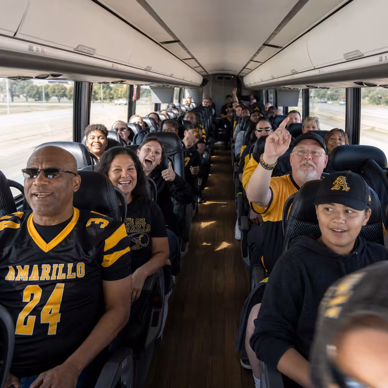 Black Mercedes Sprinter van staged for an Amarillo Sporting Event Transportation group