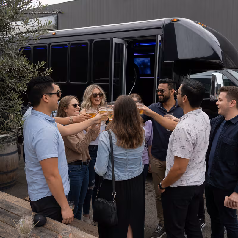 Passengers loading luggage while boarding an Amarillo group shuttle